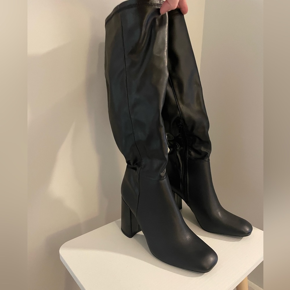 Leather knee high boots